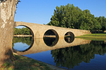 Fototapeta na wymiar Old bridge over river, Spain