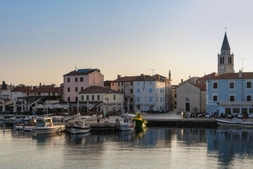 Fototapeta na wymiar sunrise in a small picturesque harbor in Istria