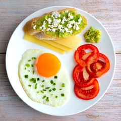 Egg, dragon fruit, tomatoes, for breakfast. Top view. Square framed.