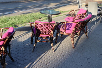 maroon cozy seats at pubs summer terrace