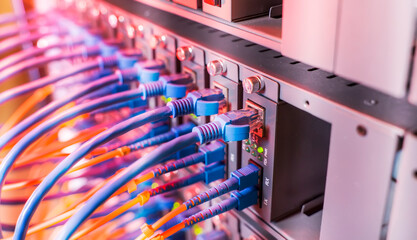 Fiber Optic cables connected to an optic ports