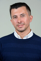 Fototapeta premium Portrait of happy young handsome man smiling