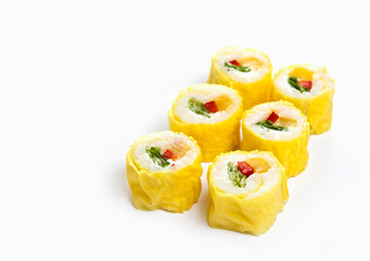 yellow maki sushi rolls isolated on white background