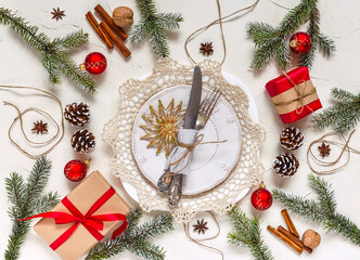 Christmas table setting, menu concept composition, decorated with pine tree branches, spices....