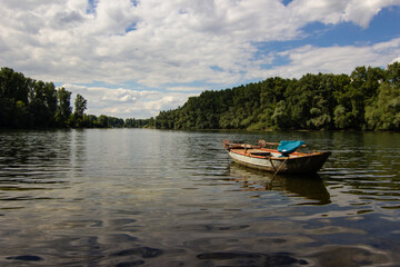 Fototapeta na wymiar Wooden boat on a river in germany