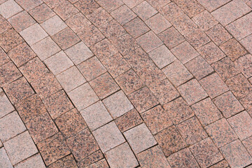 Granite cobblestoned pavement background. Natural stone textured background