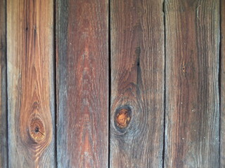 Fototapeta premium The dark background of vertical planks. Background for websites. Wooden structure, pattern