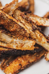 
Healthy food. Delicious eggplant baked in bread crumbs. Close-up.