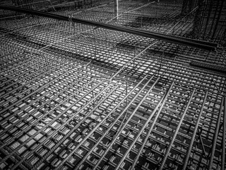 Steel Rebars for reinforced concrete. Closeup of Steel rebars. Geometric alignment of Rebars on construction site