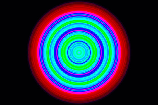 黒バックにビビッドカラーのカラフルな色のグラデーションの渦巻きの背景　赤、ピンク、青、緑