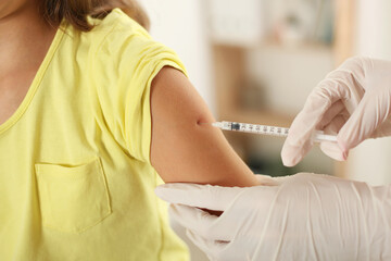 the child is vaccinated by a doctor
