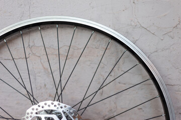 a double rim of a bicycle wheel without a tire, against a background of a textured eraser. Bicycle...