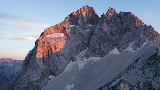 aereal view on sunset in the mountains, jalovec, triglav national park 