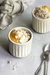 Coconut oatmeal with mango puree 