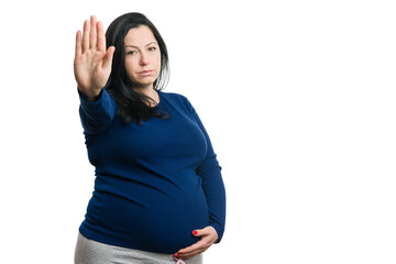 Pregnant woman showing stop gesture with hand