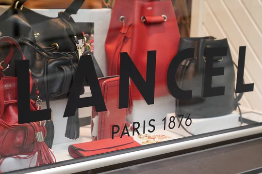 Åben dragt orientering Lancel paris logo and sign on windows french luxury shop in city street  Stock-foto | Adobe Stock