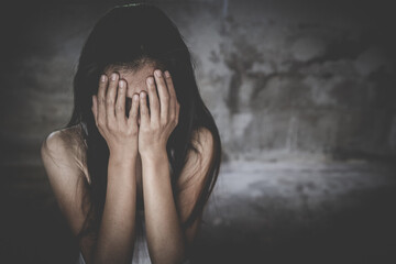  Women sitting on the floor  with depression,  family problems,  Domestic violence, Stop violence...