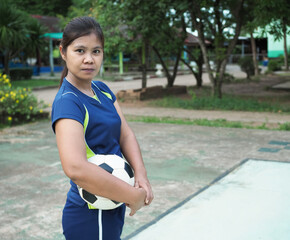 Portrait of an Asian woman Going to play sports.