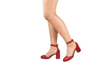 Woman legs in retro red sandals on heels.
