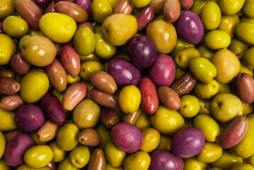 Tasty mix olives background.