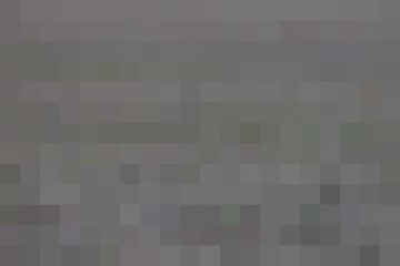 Multi-colored rectangular pixel background. The texture consisting of multi-colored squares.