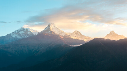 Fototapeta na wymiar Himalaya mountains range on sunrise. Mighty misty snowy Himalayas, mountain background.