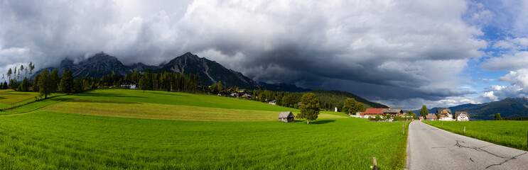 Fototapeta na wymiar Storm clouds over the Dachstein mountain range in Austria