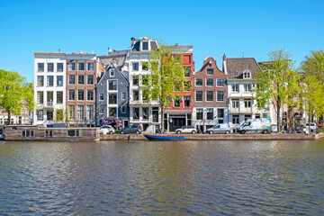 City scenic from Amsterdam at the river Amstel in the Netherlands
