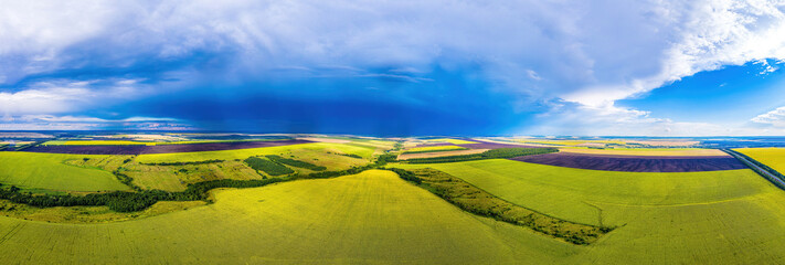 Agricultural landscape. Fields and sky. Aerial. High quality photo