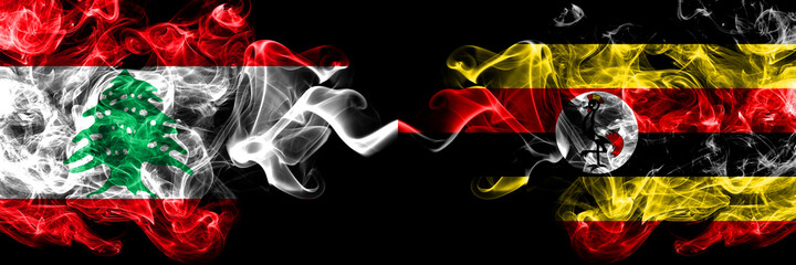 Lebanon vs Uganda, Ugandan smoky mystic flags placed side by side. Thick colored silky abstract...