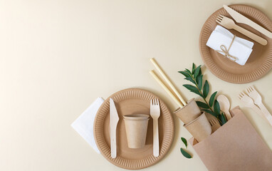 Plastic free and zero waste concept. Disposable paper tableware (cups, plates, wooden forks,...