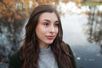 Portrait of girl in autumn park