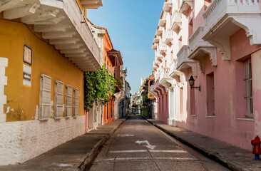 Street called Cuartel Del Fijo with its large windows and colonial facades in Cartagena, Colombia.
