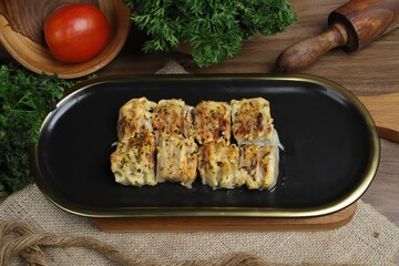 Mozzarella cheese dim sum on the table. Served in jute cloth background. Top view