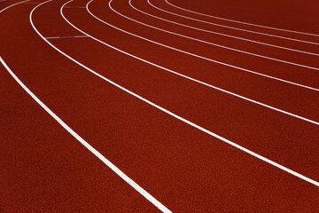 Red stadium running tracks closeup