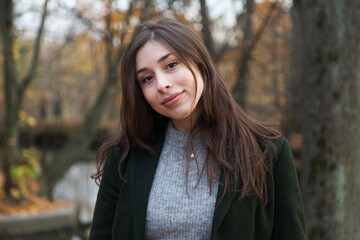 Portrait of girl in autumn park
