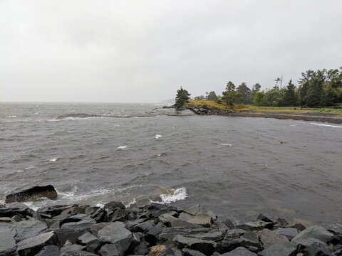Dark grey ocean and rocks