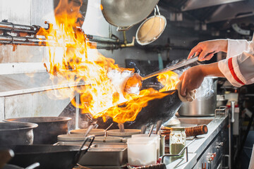 Chef stir fry cooking