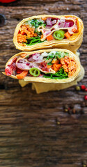 tortilla burrito wrap vegetables stuffing lavash vegetarian pita bread Menu concept Takeaway serving size fast food background top view copy space 