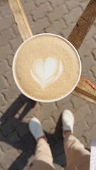 A cup of coffee with a latte art