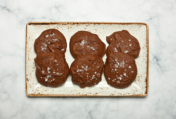 Brownie chocolate cookies on white plate