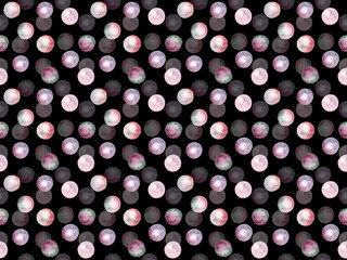 Seamless pattern. Colored transparent volumetric circles on a black background. Drawing watercolor.