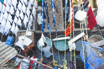 MUMBAI, MAHARASTRA, INDIA- MARCH 2020 : Dhobi Ghat (Mahalaxmi Dhobi Ghat) is a biggest open air laundry in Mumbai, India. This place is one of famous landmark and tourist attraction of Mumbai.
