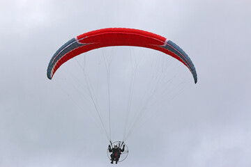 Paramotor pilot flying wing