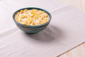 golden crispy corn flakes as breakfast concept