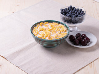 golden crispy corn flakes as breakfast concept