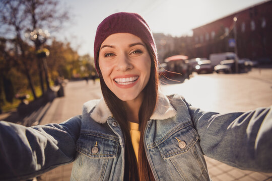 Self-portrait of her she nice attractive pretty lovely cheerful cheery brown-haired girl spending free time strolling alone fresh air traveling abroad October streetstyle