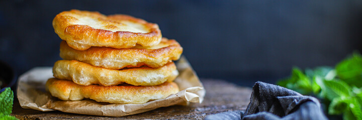 wrap flat bread tortillas from flour and water fried dough homemade cooking Takeaway handmade langos food background top view copy space