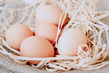 Eggs over jute sack background. Happy easter.