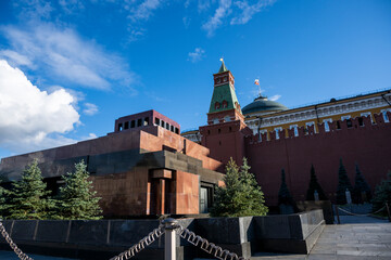 city view of the old kremlin on a beautiful temple and a large square against the sky with clouds